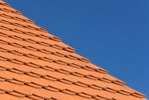 orange-roof-and-blue-sky-scaled
